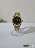 ساعت طرح رولکس زنانه استیل تقویم دار صفحه مشکی بند طلایی نقره ای