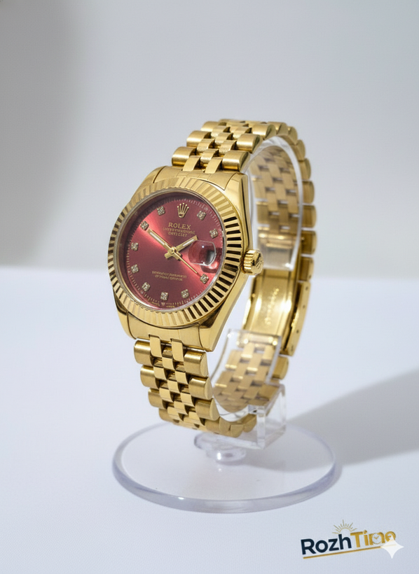 ساعت طرح رولکس زنانه استیل تقویم دار صفحه زرشکی بند طلایی