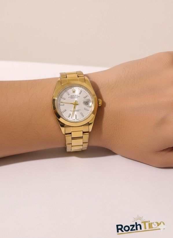 ساعت طرح رولکس زنانه استیل تقویم دار صفحه سفید بند طلایی